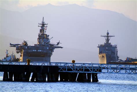 The Us Navy Usn Wasp Class Amphibious Assault Ship Uss Essex Lhd 2 Left And The Usn Dock