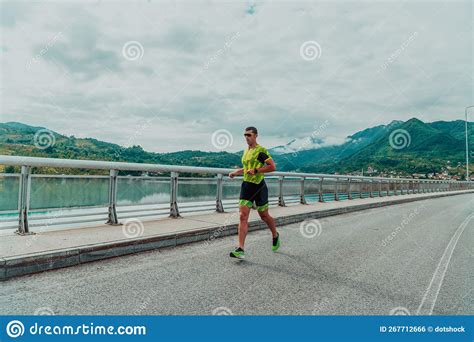 An Athlete Running a Marathon and Preparing for His Competition. Photo ...