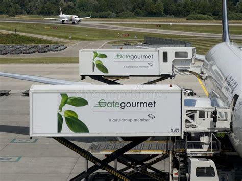 Gategourmet Catering Trucks Loading Meals For An International Flight