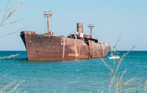 A Shipwreck. an Old Wreck Abandoned at Sea Stock Image - Image of boat ...