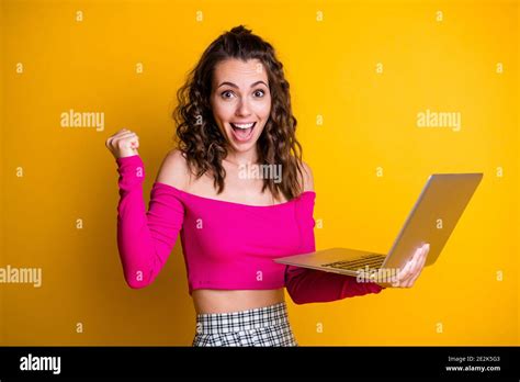 Photo Of Lady Wavy Hairdo Arm Hold Netbook Excited Crazy Mad Open Mouth