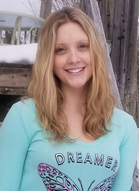 Premium Photo Close Up Portrait Of Smiling Girl Standing Outdoors