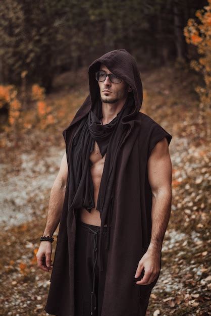 Premium Photo A Man With A Naked Torso Stands On The Of The Autumn Forest