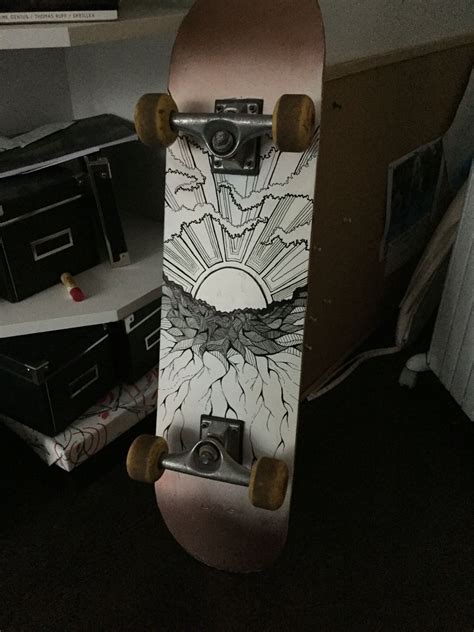 DIY Skateboard Design with Spray Paint and Paint Pens