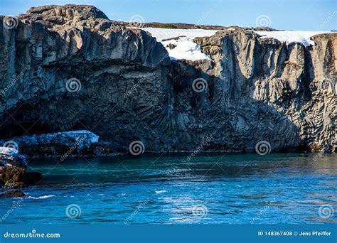 Columnar Basalt Formation Over Turquoise Water Stock Photo - Image of formation, turquoise ...