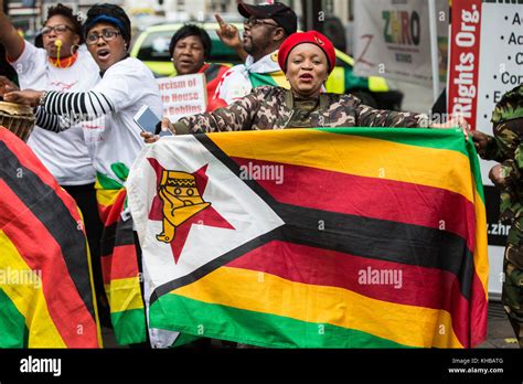 London, UK. 15th Nov, 2017. The Zimbabwean community celebrates outside