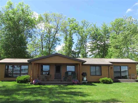 Pin On Burt Lake Waterfront Homes