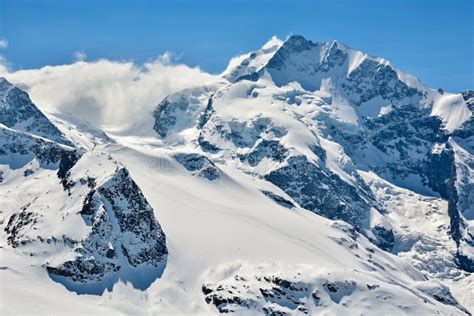 Piz Bernina in Switzerland stock image. Image of diavolezza - 105273451