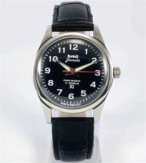 hmt janata black dial  english numerals  jewels  shock