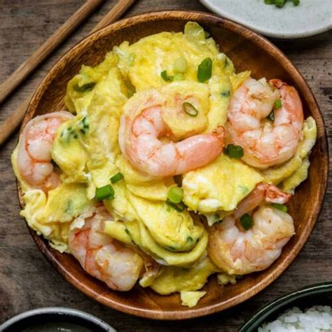 Chinese Scrambled Eggs And Shrimp Pups With Chopsticks