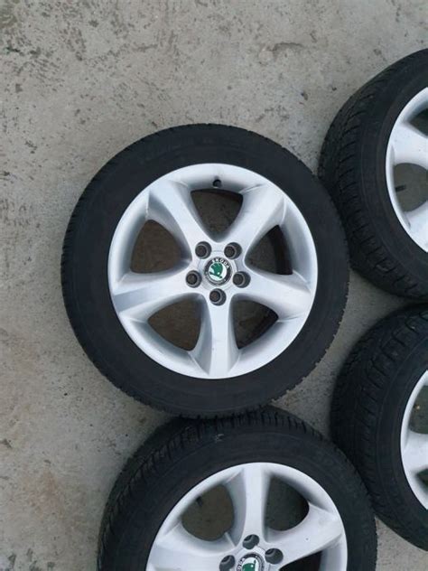 Alu Felge 5x100 15 4kom Skoda Rapid Fabia ZIMSKE GUME