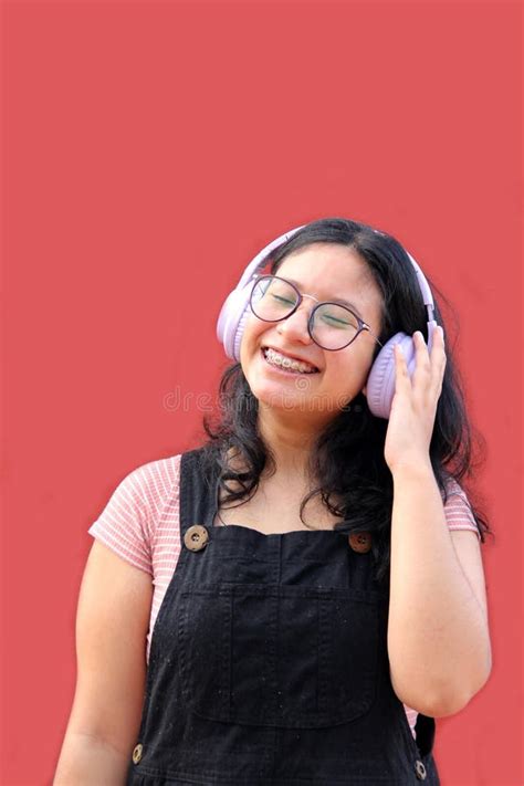 Year Old Latina Woman Points To Something That She Likes Surprises And Excites Such As