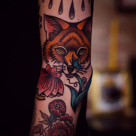 Traditional fox head tattoo - Tattoogrid.net