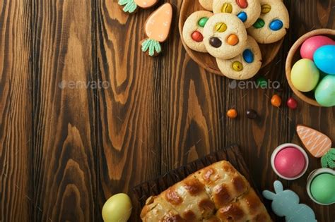 Easter Hot Cross Buns With Colored Eggs Easter Gingerbread Rabbits And Cookies Over Dark Brown