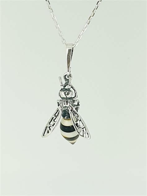 Baltic amber Queen bee Penandt | Black Pearl Whitby