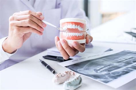 The Main Differences Between Dentures And Dental Implants Which Is