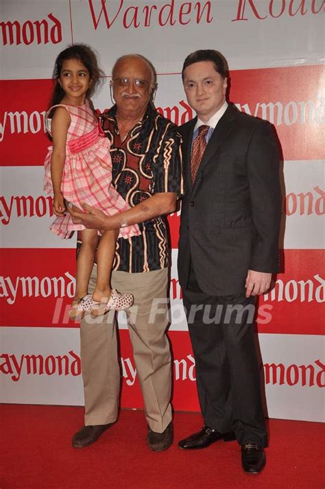 Gautam Singhania with his dad and daughter at Raymonds new store at ...