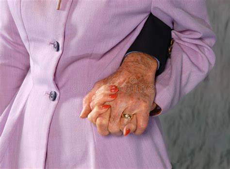 Older Couple Holding Hands stock image. Image of band - 1577305