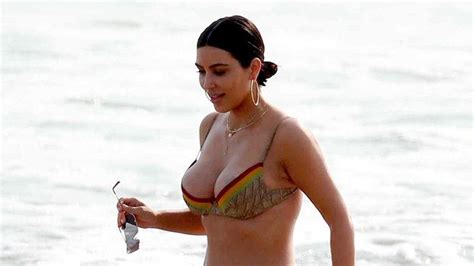 Kim Kardashian Wests Body Defies Gravity In A Vintage Dior Bikini