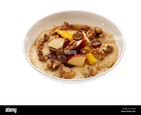 Oatmeal with Fruit and Nuts Stock Photo - Alamy