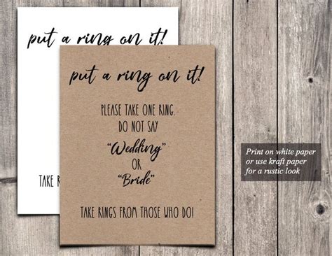 Two Greeting Cards With The Words Put A Ring On It And Please Take One