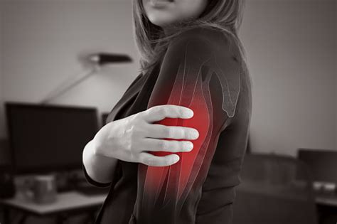 Woman With Upper Arm Pain Stock Photo - Download Image Now - iStock