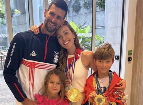 Novak Djokovic poses with the gold medal with his beautiful family ...