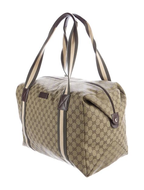 Gucci Gg Canvas Duffle Bag Bags Guc The Realreal