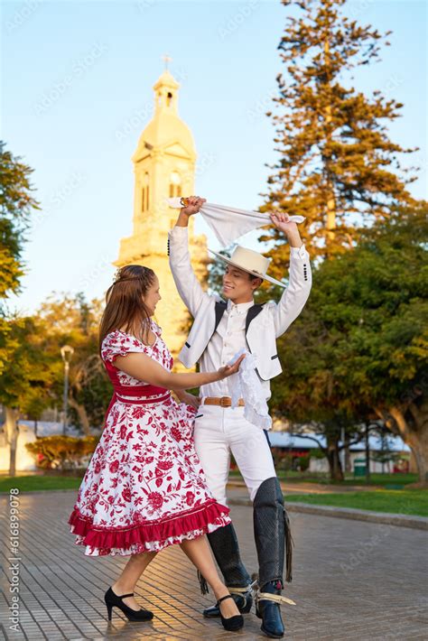 portrait young adult latin american couple dancing cueca with huaso ...