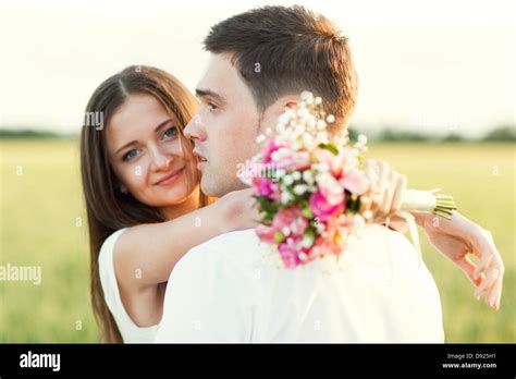 Just Married Couple Hugging And Smiling Stock Photo Alamy