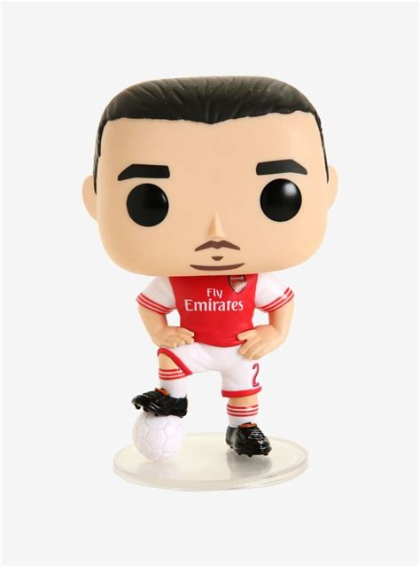 a figurine of a soccer player with black eyes