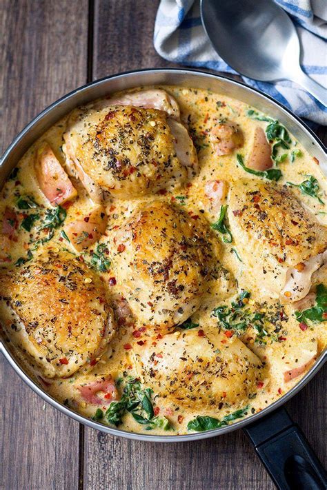 One Pan Chicken And Potatoes With Garlic Parmesan Spinach Cream Sauce