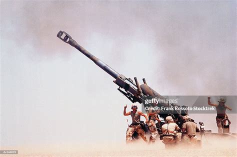 Troops On Ground Firing M198 Howitzer Gun High-Res Stock Photo - Getty ...