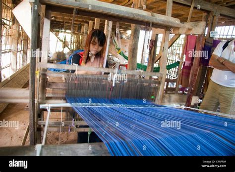 A Young Girl At Work Weaving On A Loom Cambodia Stock Photo Alamy