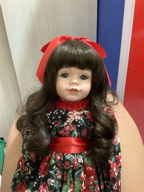 Please help me identify her. Checked the back of her head, her foot