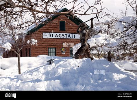 FLAGSTAFF, AZ/US - January 20, 2023: Flagstaff Snow Downtown Gandy Dancer Statue. Sculpture by ...