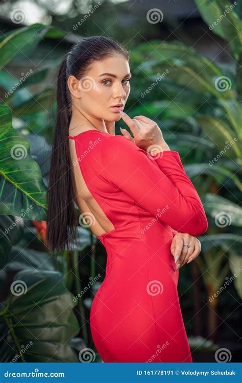 Beautiful Girl Resting And Enjoying Vacation In Tropical Forest Close