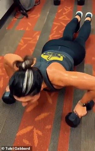 tulsi gabbard shares video   intense workout  burpees arm lifts