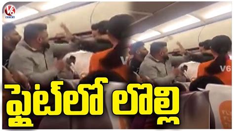 Fight Between Passengers In Flight Video Goes Viral V6 News Win