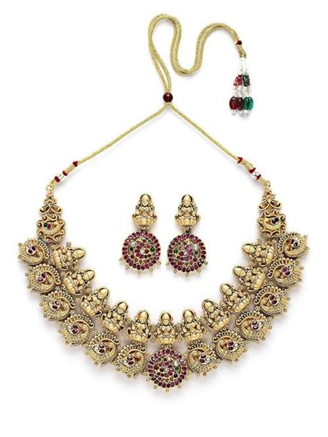 Buy Karatcart Metal Gold Plated Laxmi Mata Temple Jewellery Set For