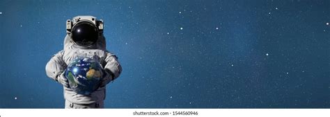 Astronaut Holding Planet Earth World Solar Stock Illustration