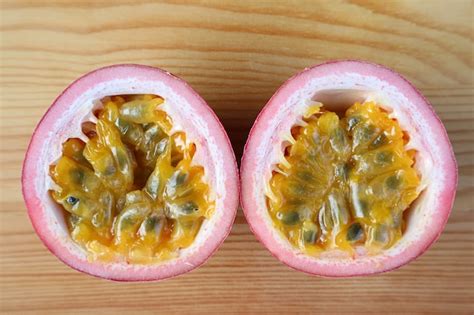 Premium Photo Top View Of Fresh Ripe Passion Fruit Cut In Half