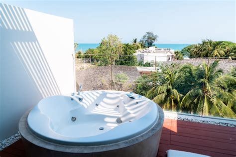 Premium Photo | Jacuzzi bath tub on balcony