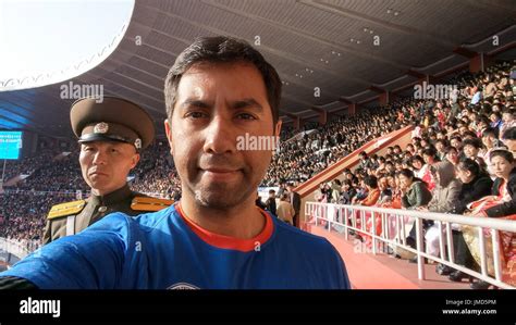 Being watched by a guard in the Rungrado 1st of May stadium. With a ...