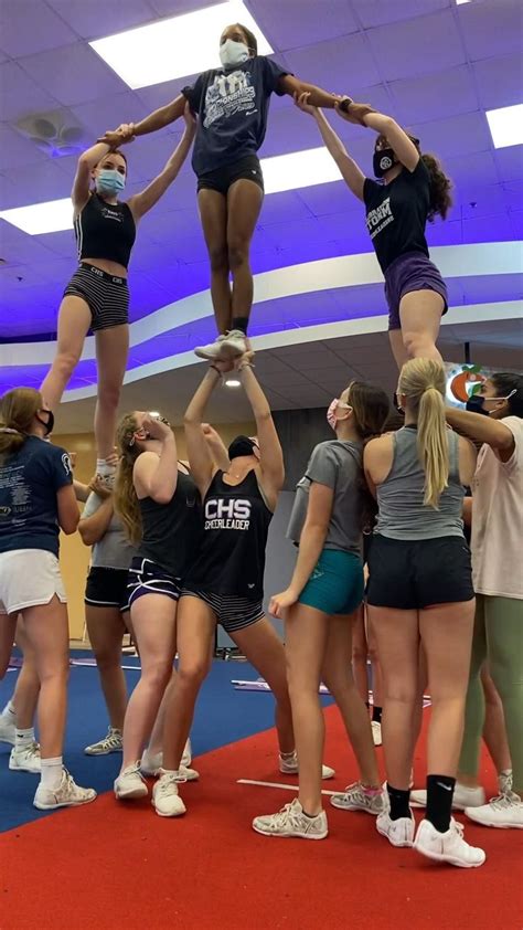 One Man Pyramid In 2024 Cheer Stunts Cool Cheer Stunts Cheer Poses