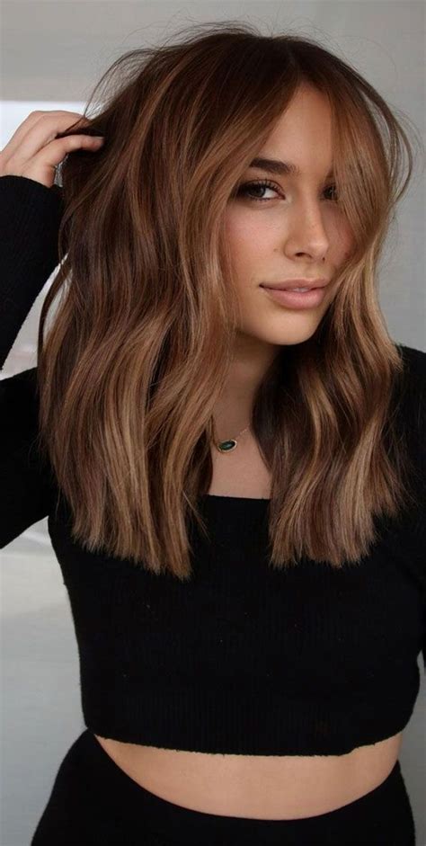 38 Best Hair Colour Trends 2022 Thatll Be Big Dark Hair Colour With Long Bangs Reddish Brown