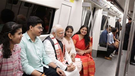 Pm Modi Takes A Metro Ride Interacts With Co Passengers Watch India Tv