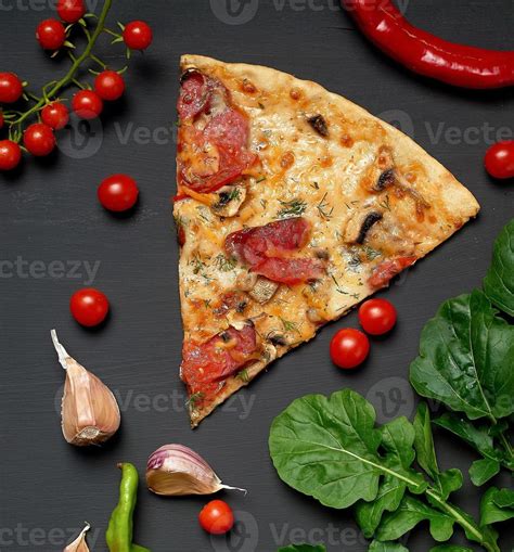 Triangular Slice Of Baked Pizza With Mushrooms Smoked Sausages