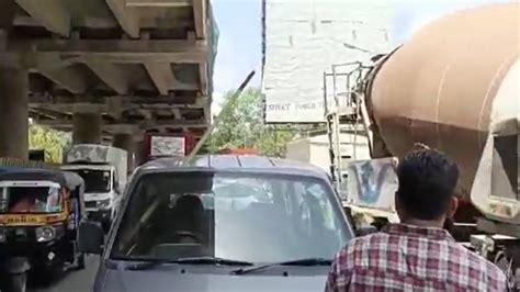 Thane Iron Rod Falls From Workers Hand Pierces Car Roof And Misses