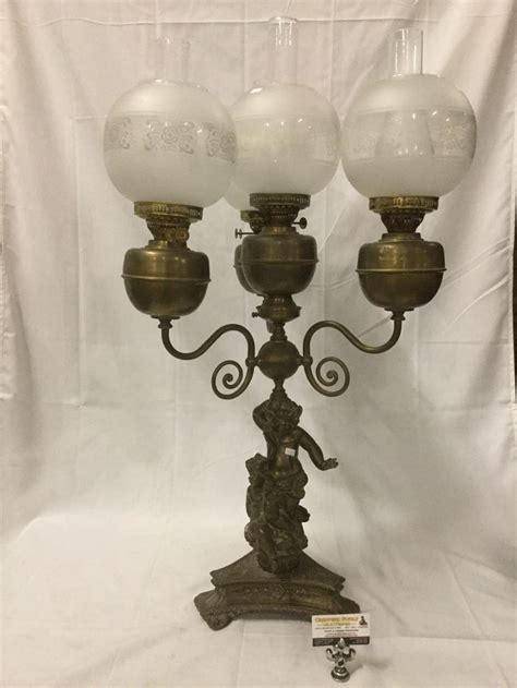 Sold Price: Antique brass oil lamp w/ four globe hurricane shade lights ...